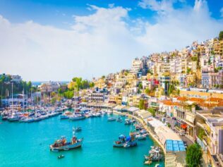 Panoramic,View,Of,Mikrolimano,With,Colorful,Houses,Along,The,Marina